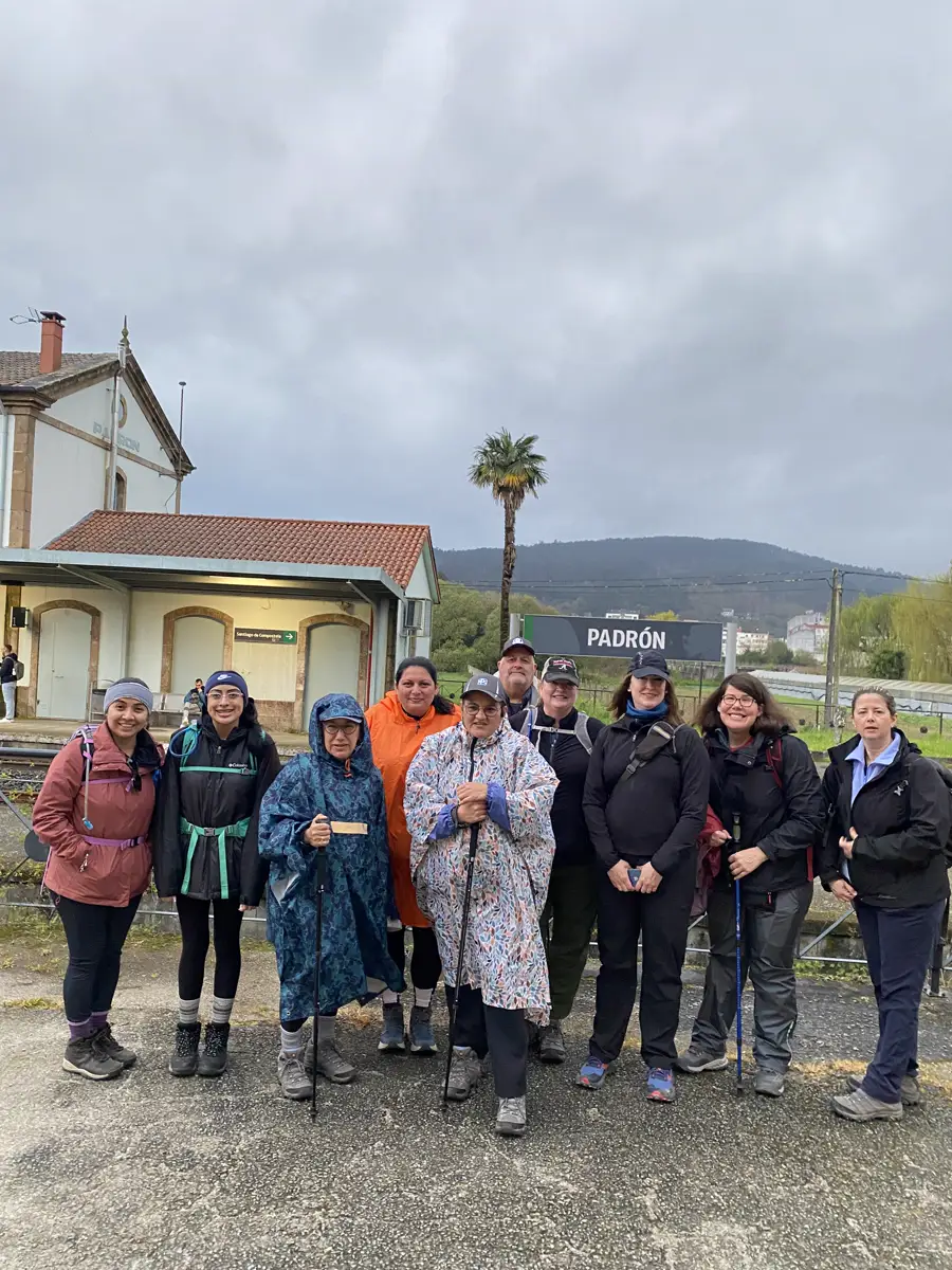 A Camino group celebrating together in Padrón